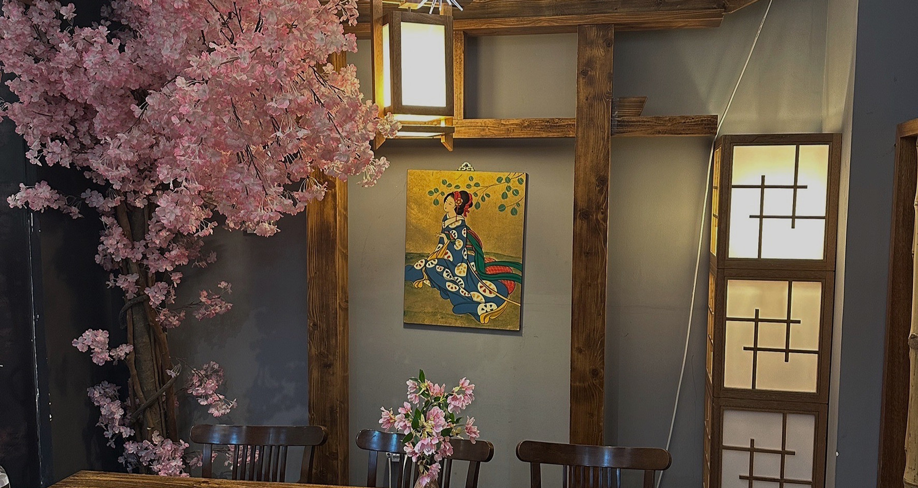 Cherry blossom, wood framing and shoji-style lighting at RAYU