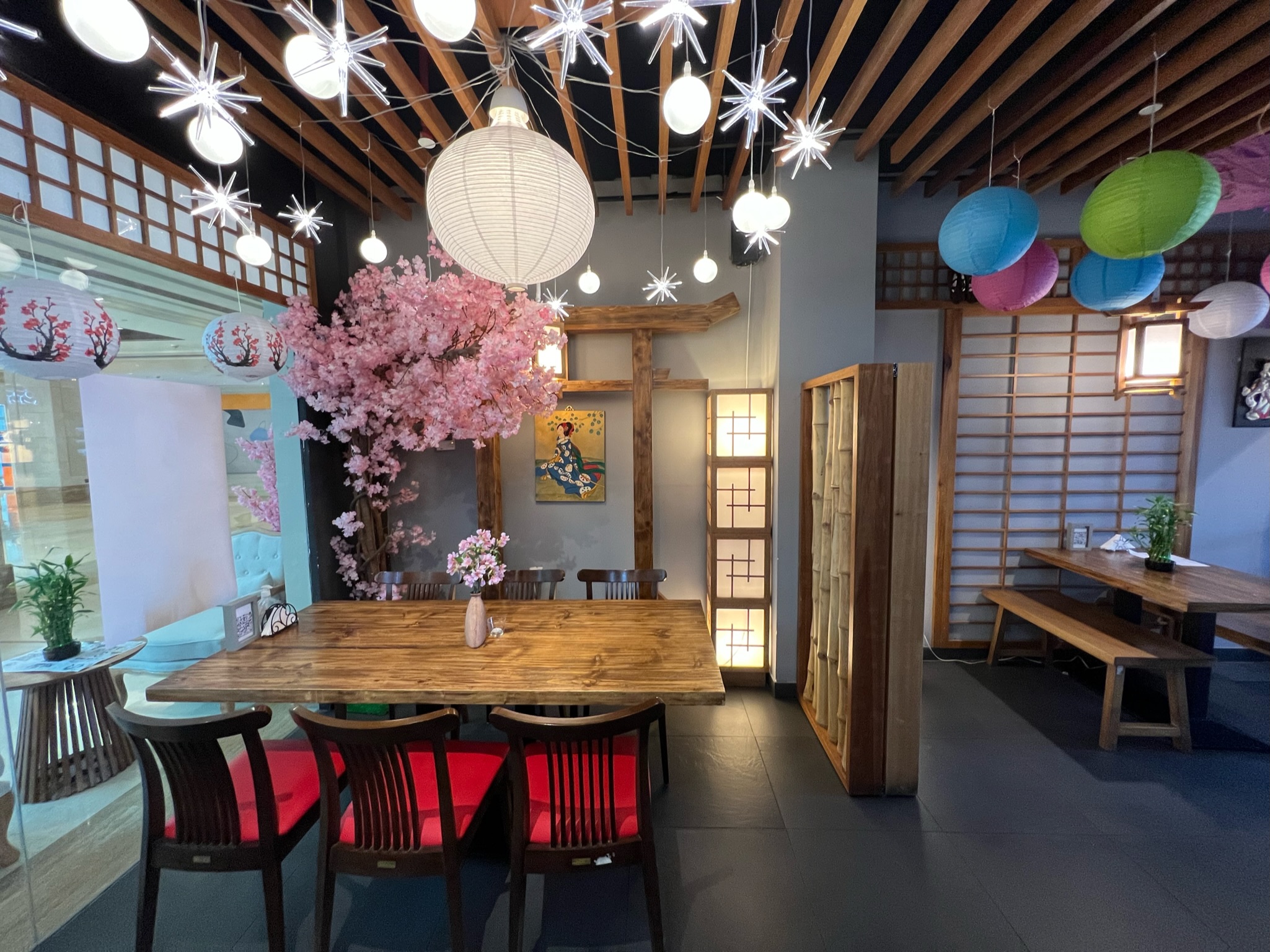 RAYU dining room with cherry blossom and lanterns